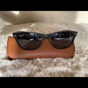 Ray-Ban polarized wayfarer sunglasses.